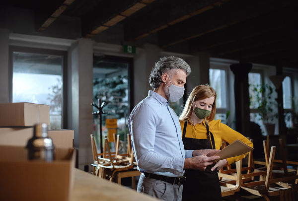 restaurant owner with employee